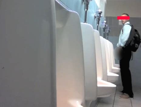 spy at urinal|Video Voyeur Haunted College's Men's Restrooms .